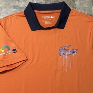 Lacoste Sport Polo Shirt Mens Medium Orange Short Sleeve Paint Tennis Ultra Dry